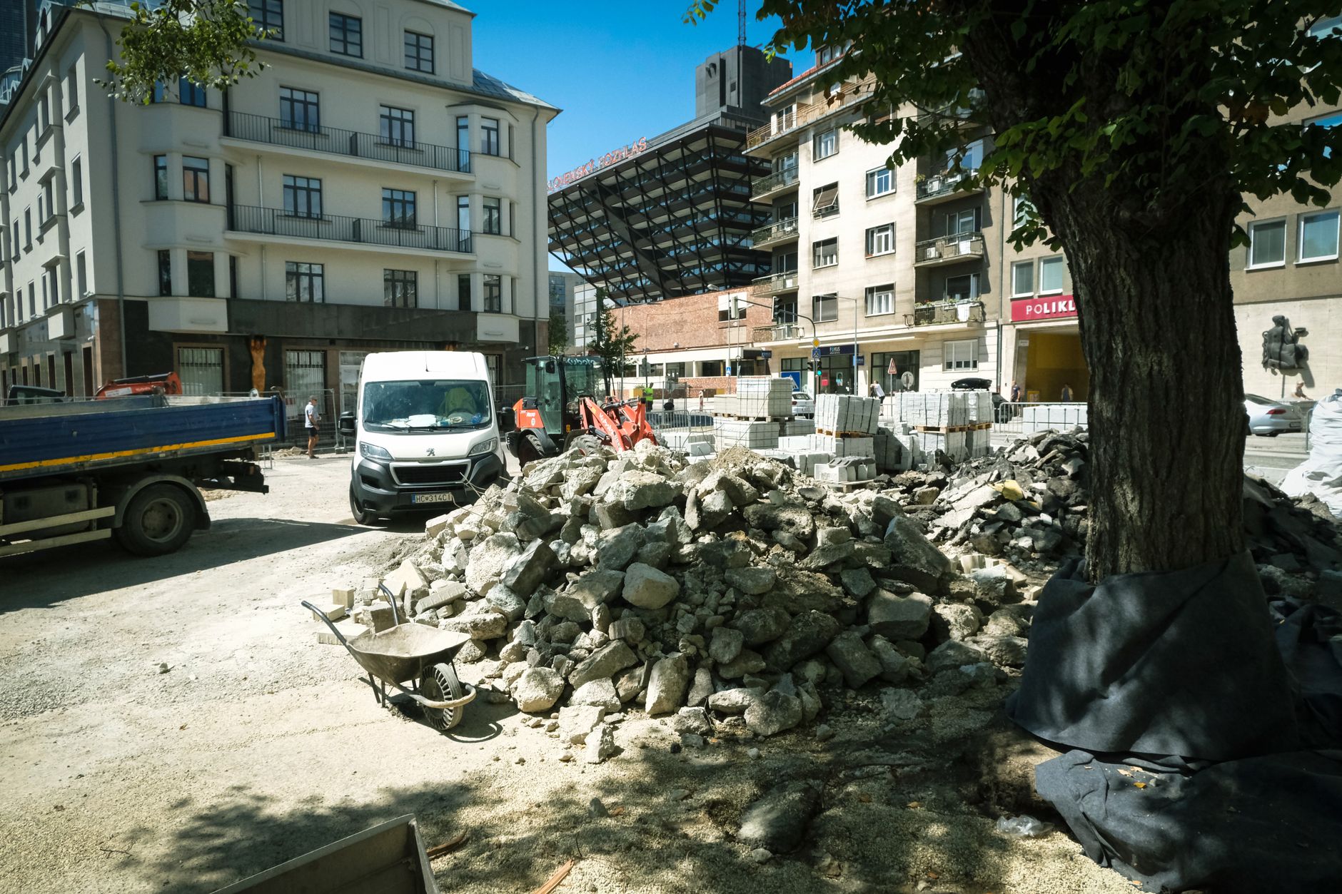 A construction site in downtown Bratislava showing heavy roadwork and urban renewal.