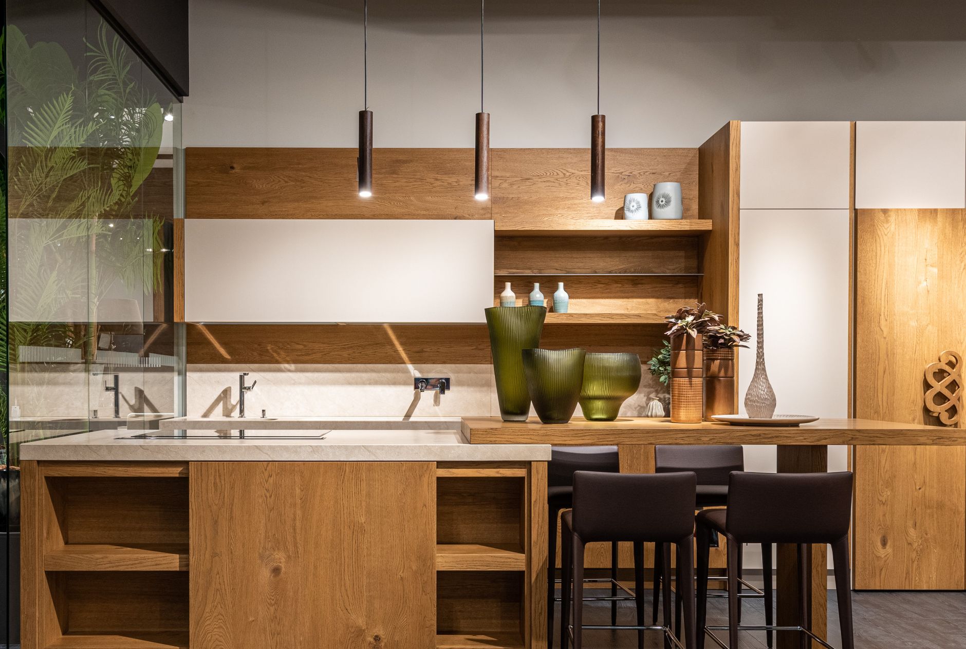 Contemporary interior design of spacious trendy kitchen with empty furniture and decorative elements in modern apartment