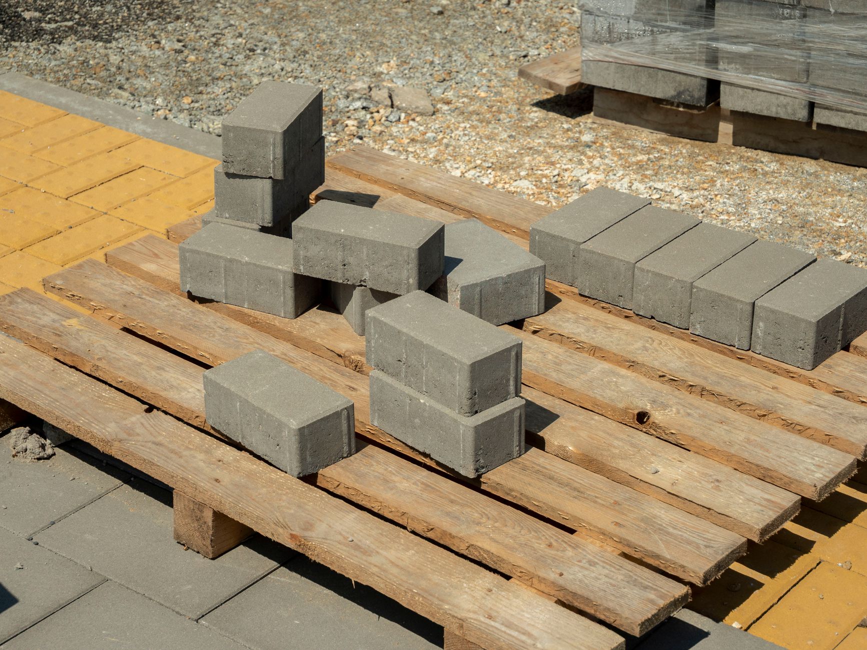 Concrete blocks stacked on a pallet at a construction site in Wrocław, Poland.